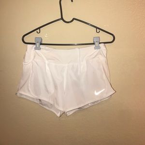 White Nike athletic shorts